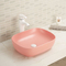 Batteri non crescere sopra il lavandino ceramico pulito facile di contro del bagno rosa del lavabo